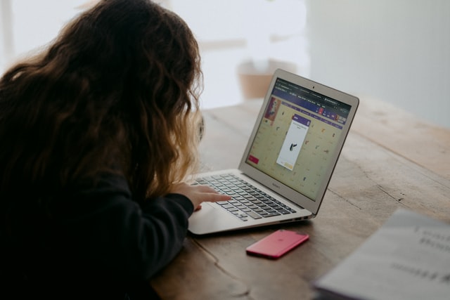 Girl on computer back to school